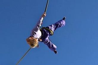 kid on trampoline
